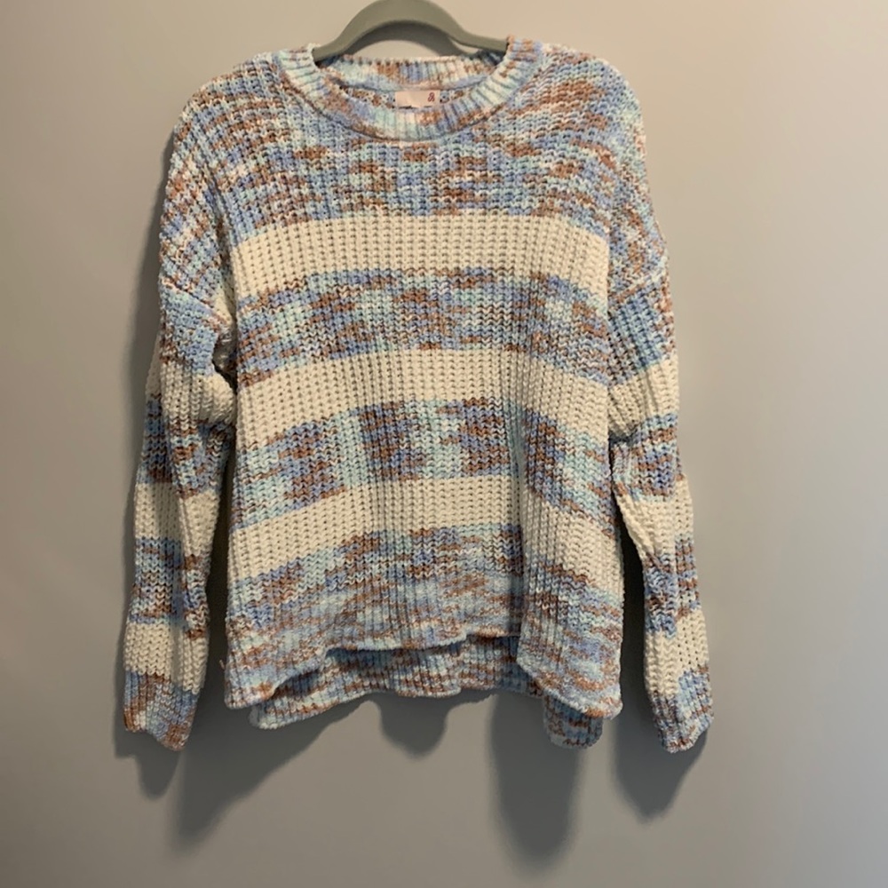 Is brand new with tags. A versatile, staple piece for any closet.